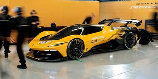 Side View of a Yellow and Black 2026 Corvette CX.R Racing on a Track