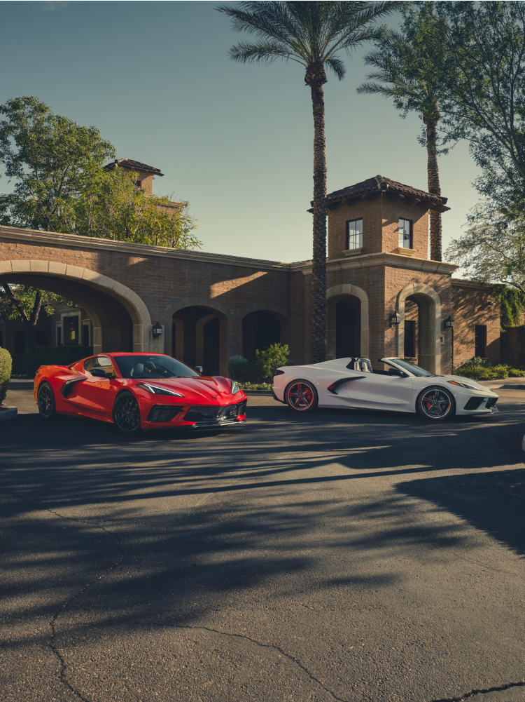 Two 2026 Chevrolet Corvette Stingrays Parked in Front of a House