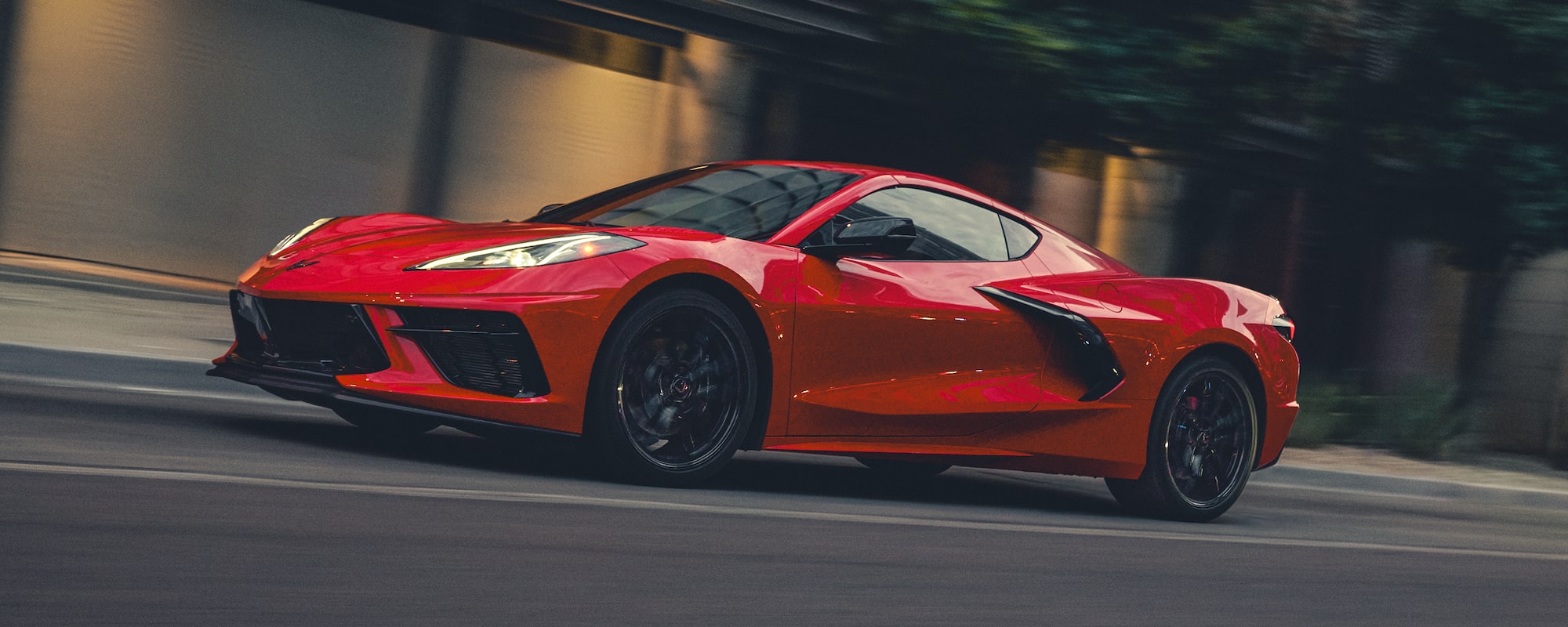 2026 Chevy Corvette Stingray Speeding Down a Road