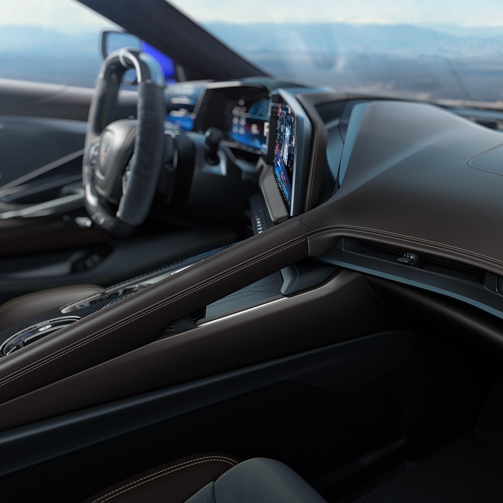 2026 Chevy Corvette Z06 Interior in Very Dark Atmosphere with Natural Tan Accents