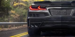 Close-up of the Rear of a 2025 Chevy Corvette E-Ray with Its Taillight on Right Side of the Frame