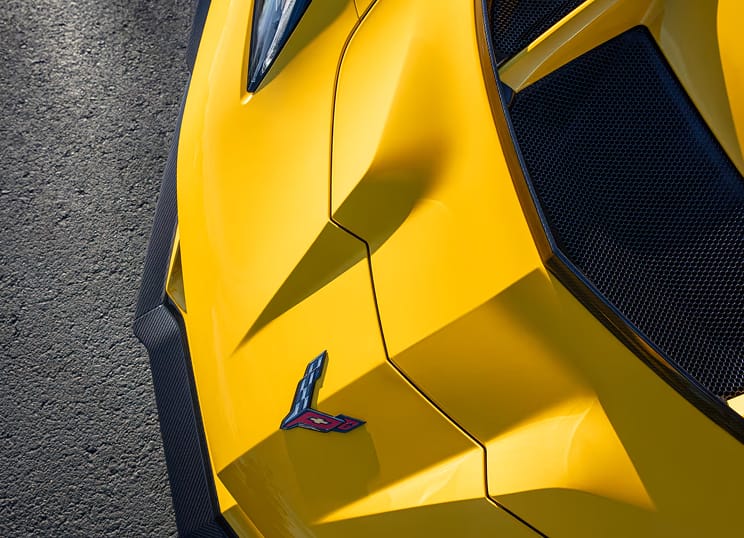 Close-up aerial view of Chevy Corvette ZR1 supercar’s front section.