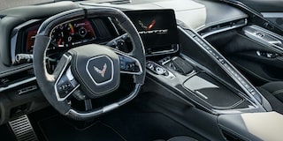 Driver’s Seat View of the Steering Wheel and Dashboard of a Chevy Corvette Z06
