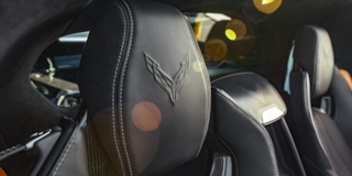 Close-up of the Chevy Crossed Flags Logo Embedded in the Seat of 2025 Chevy Corvette Z06