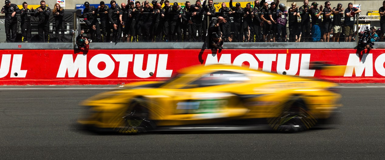 A yellow blur, the No. 33 Chevrolet Corvette blazes across the winning line to seal victory in the LMGT3 class at Le Mans 24 Hours, 2026.
