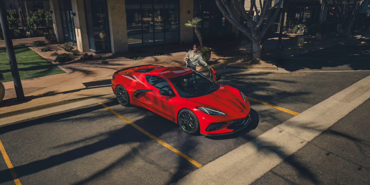 2026 Chevy Corvette Stingray Parked in Front of a Storefront