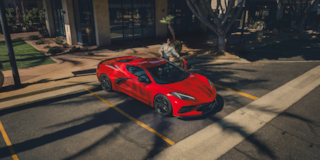 2026 Chevy Corvette Stingray Parked in Front of a Storefront