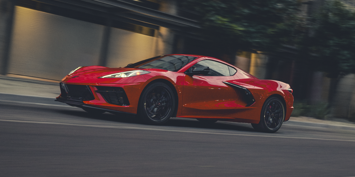 2026 Chevy Corvette Stingray Speeding Down a Road